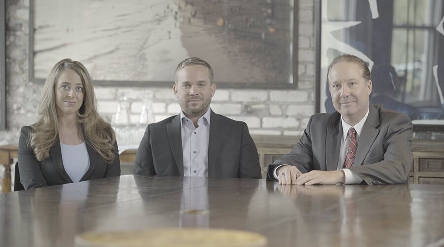 Attorney Paul Reed, Ryan Reed, Jacquelyn Reed (Right to Left)