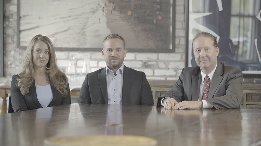 Attorney Paul Reed, Ryan Reed, Jacquelyn Reed (Right to Left)